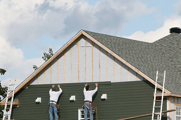 Professional Siding Contractor technician working in Grove City, FL